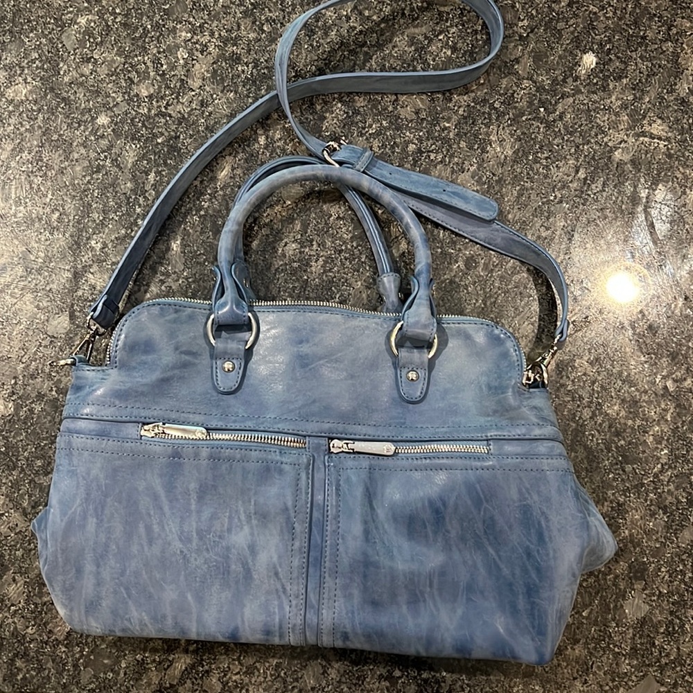Gorgeous soft blue faux leather bag . Tons of room